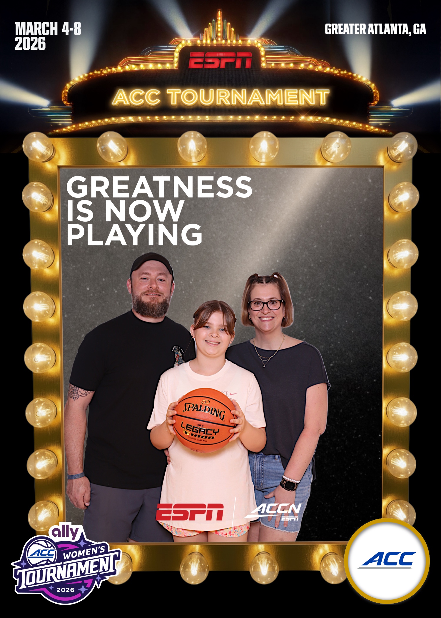 Family in a marquee-light frame at the ESPN ACC Tournament photo activation in Atlanta